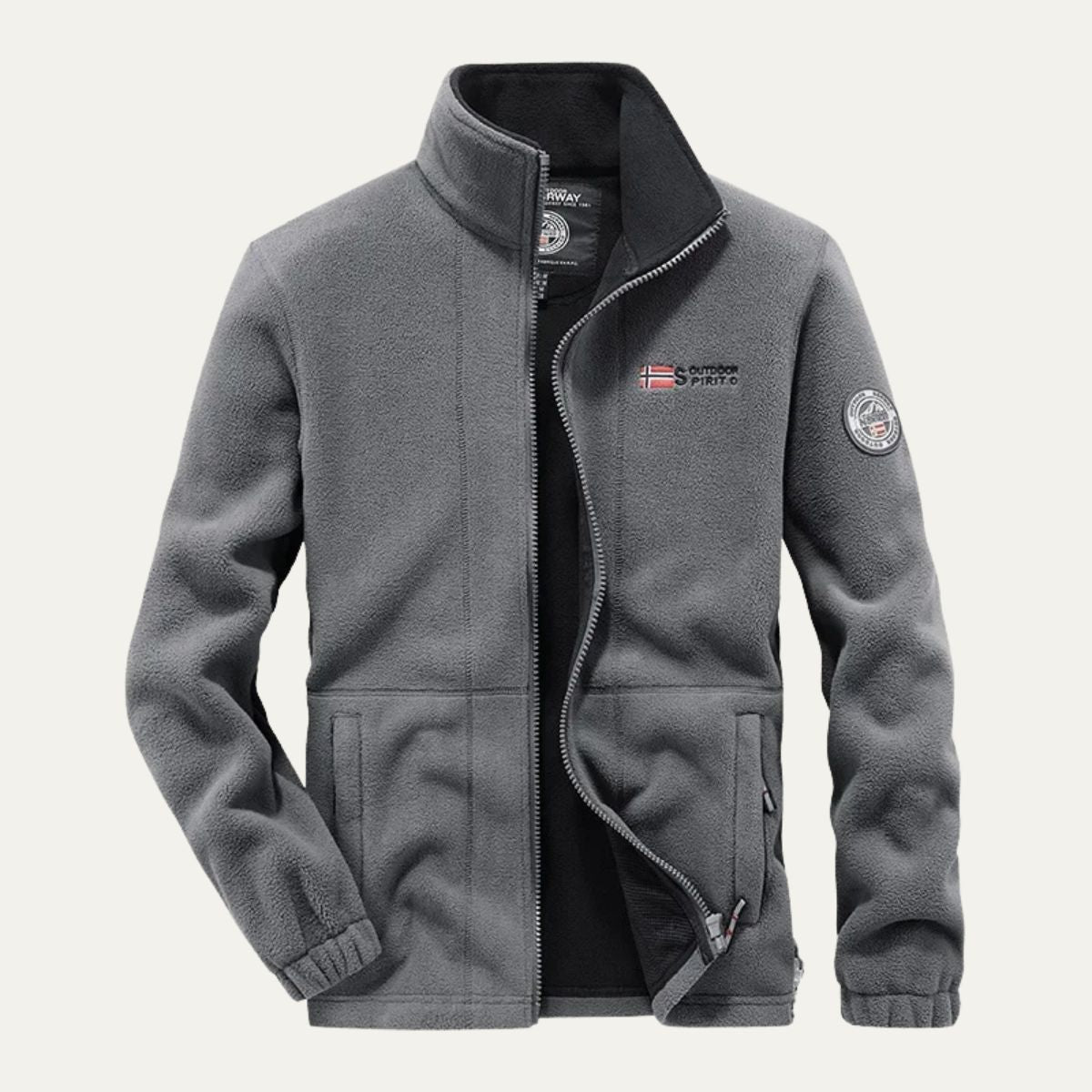 Men's gray fleece-lined outdoor jacket with full-zip front and sleeve patch