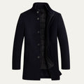 Navy wool overcoat with button front, stand collar, and flap pockets