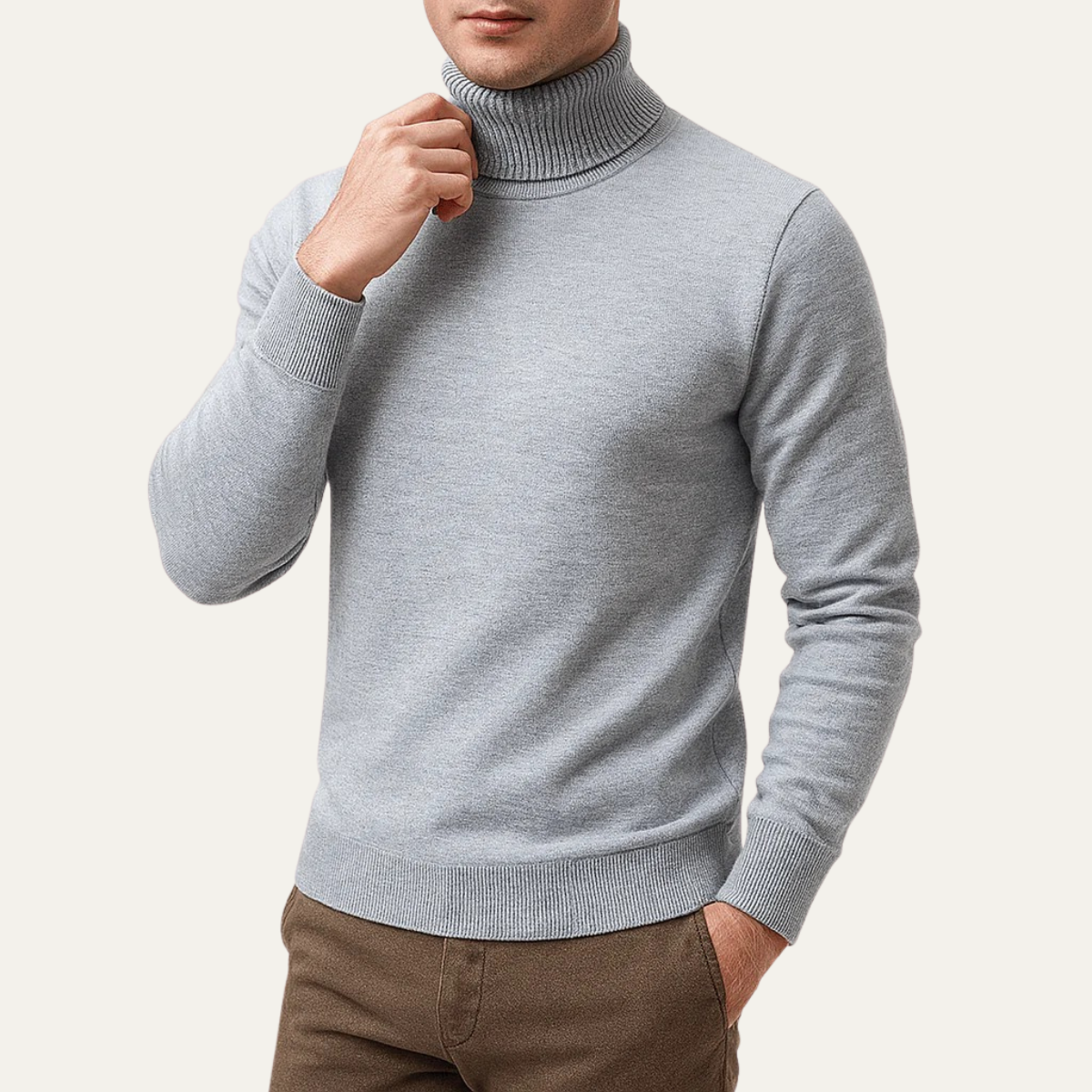 Light gray men's turtleneck knit sweater with raised collar and ribbed cuffs