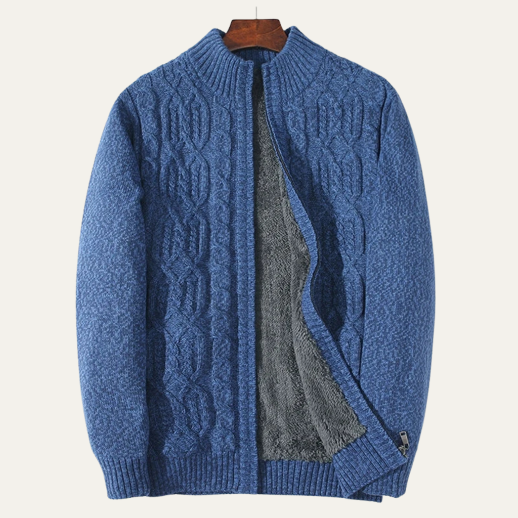 Blue zip-front cable-knit cardigan with gray fleece lining panel shown