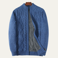 Blue zip-front cable-knit cardigan with gray fleece lining panel shown