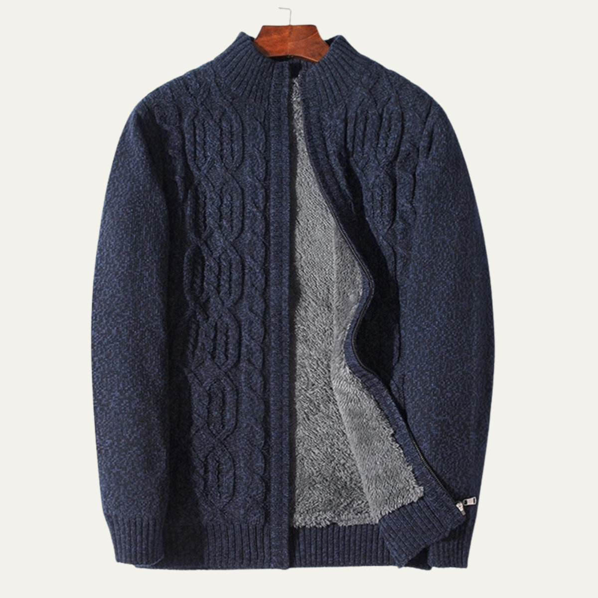 Navy blue zip-front cable-knit cardigan with gray fleece lining panel