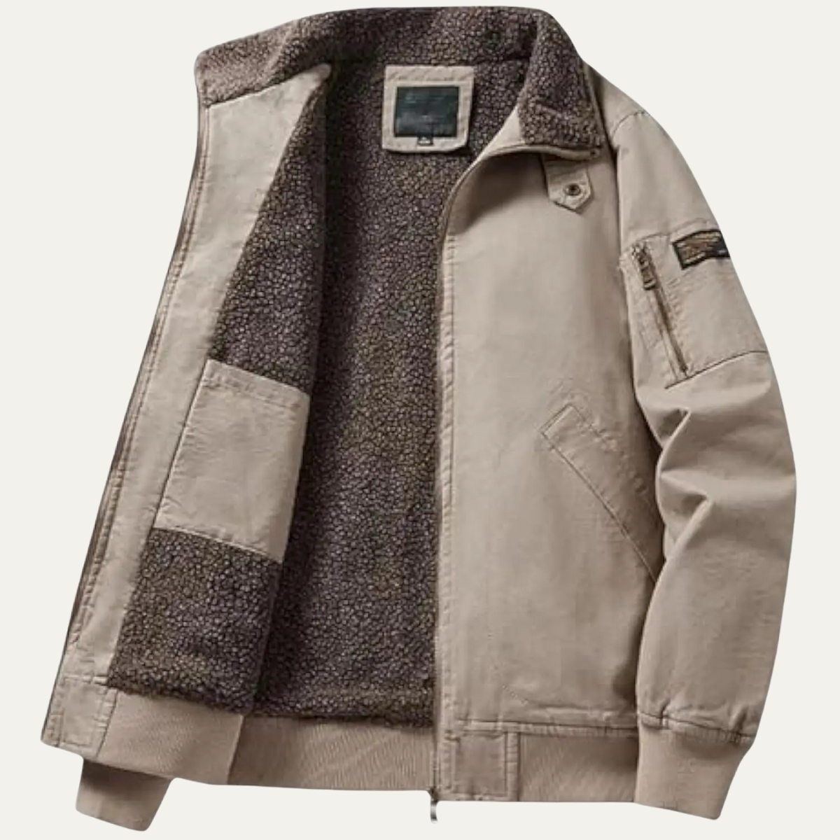 Light khaki bomber jacket with tan shearling lining and front zip