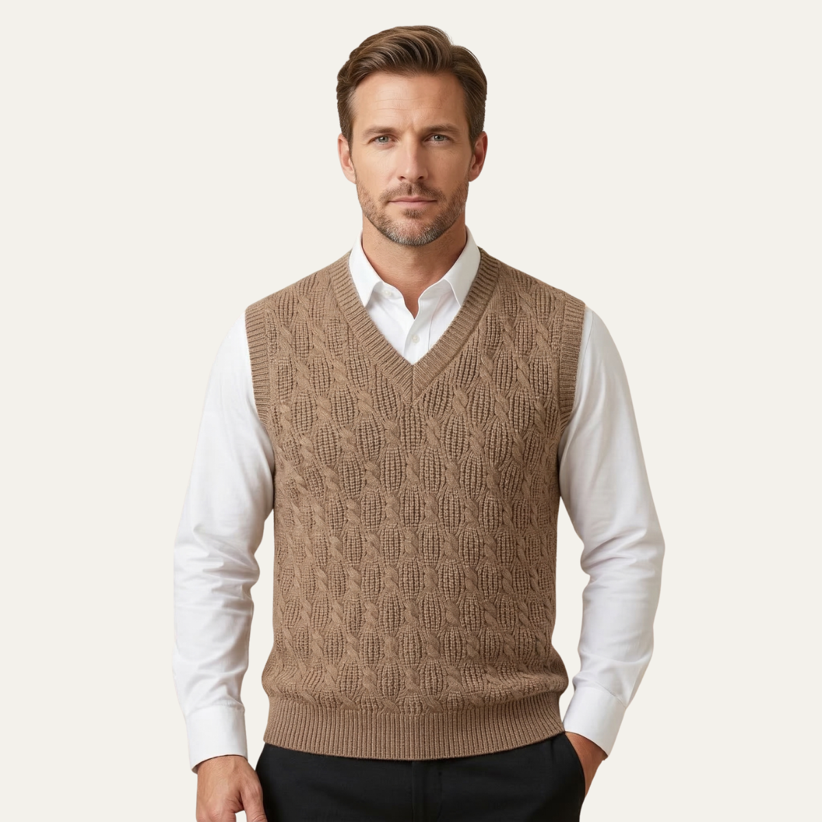 Men's khaki textured knit V-neck sweater vest worn over a white button-down shirt