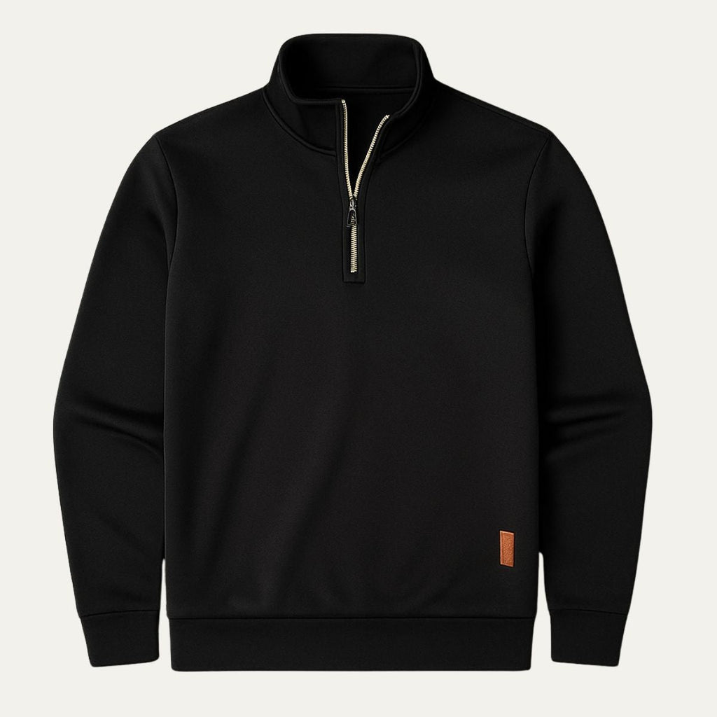 Men's black half-zip fleece pullover with stand collar and long sleeves, tan patch