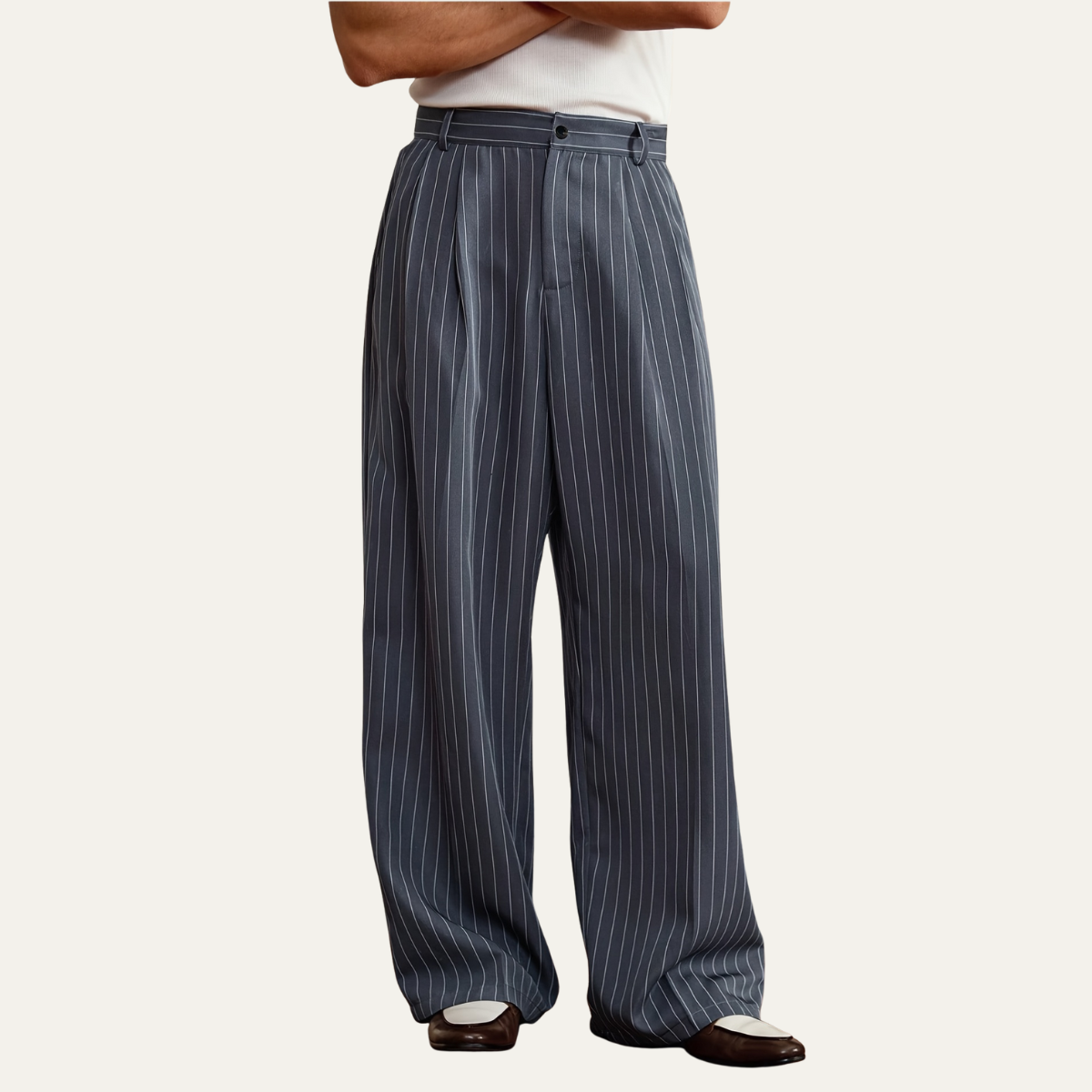 Side view of navy pinstripe wide-leg dress pants with pleated front