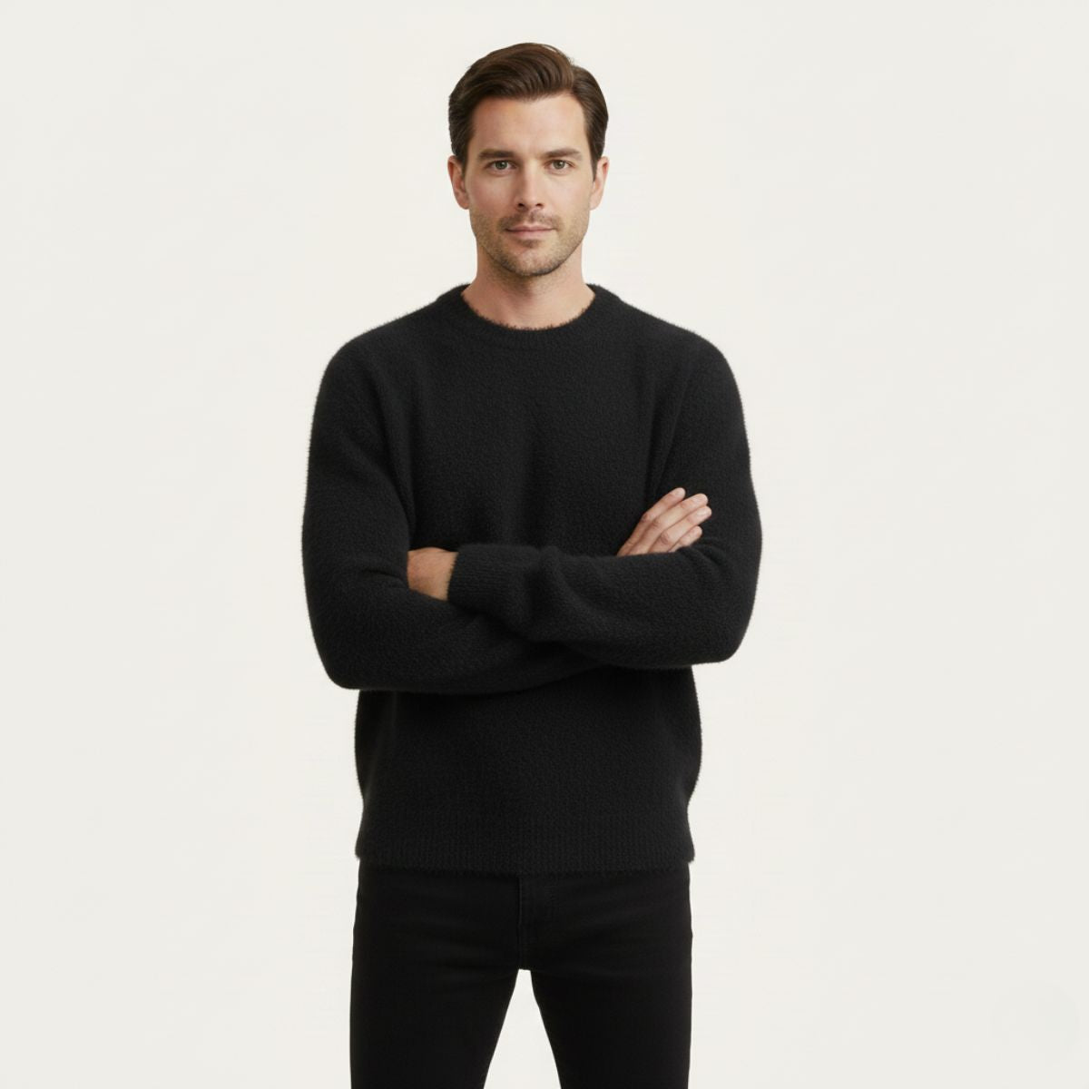 Black crewneck cashmere sweater with ribbed cuffs and hem