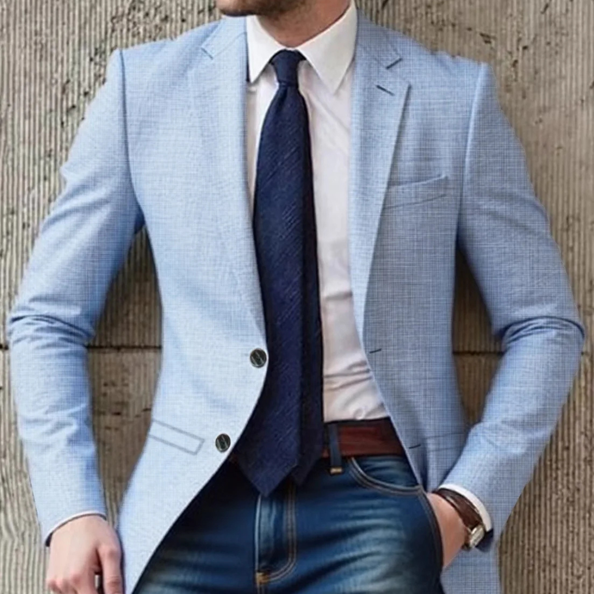 Men's sky blue blazer with notch lapels, flap pockets, and navy tie