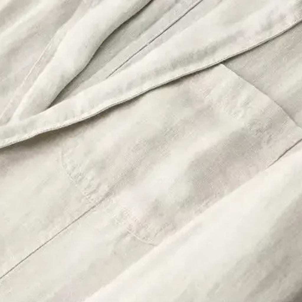 Cotton-linen suit fabric close-up, off-white woven texture