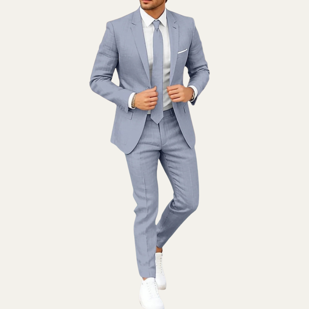 Men's light blue suit set with blazer and matching trousers; striped tie detail