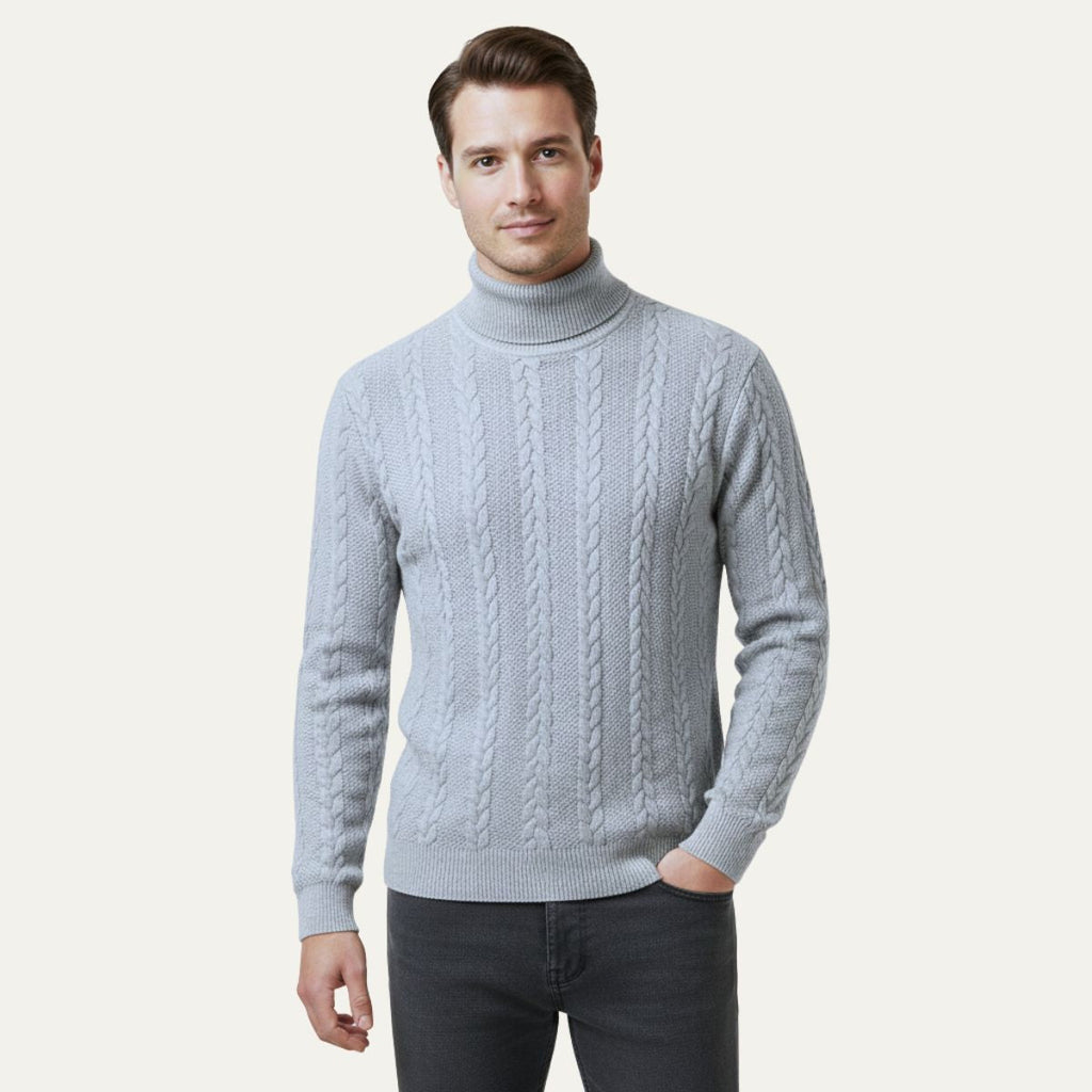 Men's light gray cable knit turtleneck sweater on model, long sleeves
