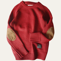Red knit sweater with suede elbow patches and ribbed cuffs and hem