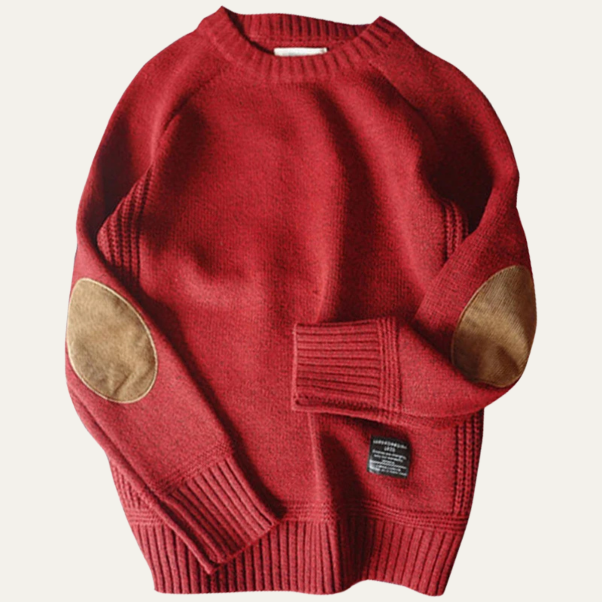 Red knit sweater with suede elbow patches and ribbed cuffs and hem