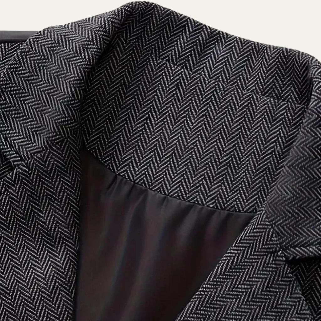 Men's tweed waistcoat gilet close-up of herringbone fabric and dark lining