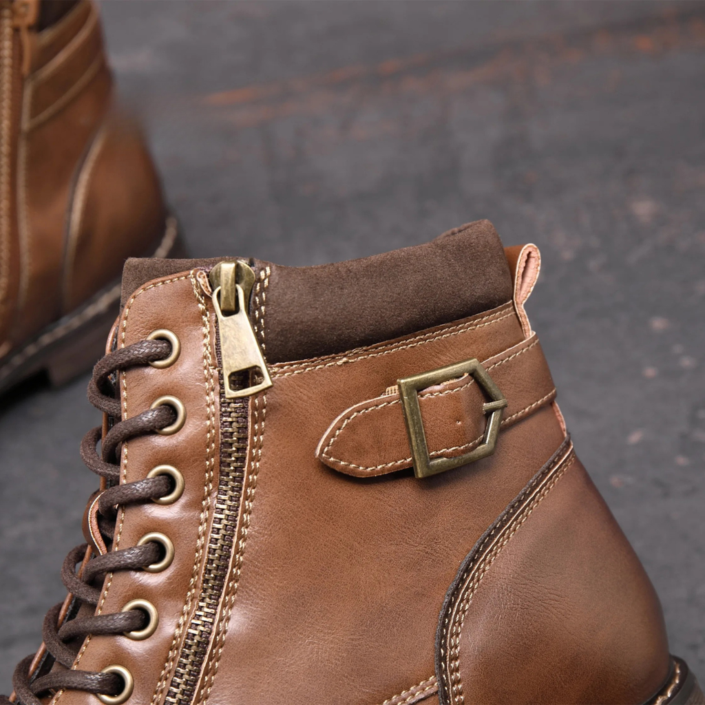 Brown ankle boot with lace-up front, side zipper, and ankle strap