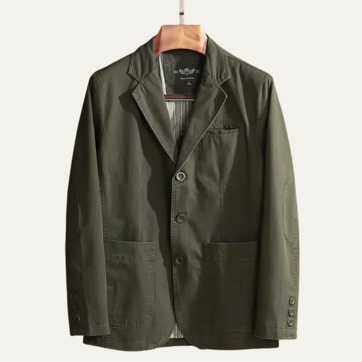 Men's lightweight green blazer jacket with notch lapels, button front, and chest pocket