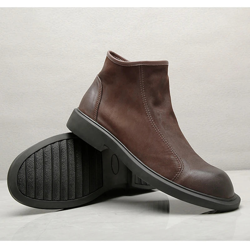 Men's warm plush zip-up leather ankle boot, brown, view of tread outsole and heel