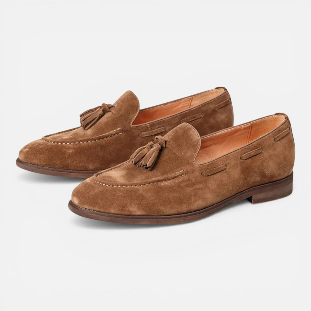 Pair of men's faux leather tassel loafers in tan-brown, slip-on moc toe style