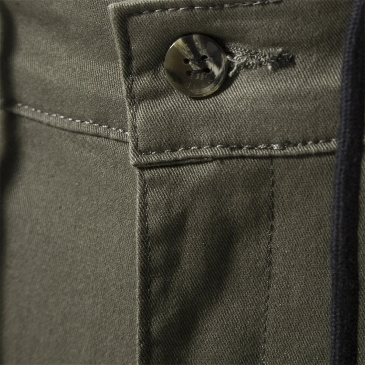 Army-green men’s cargo jogger pants, button closure and waistband detail