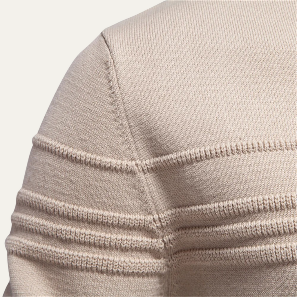 Men's beige knit sweater close-up, ribbed collar and hem with contrast stitch lines