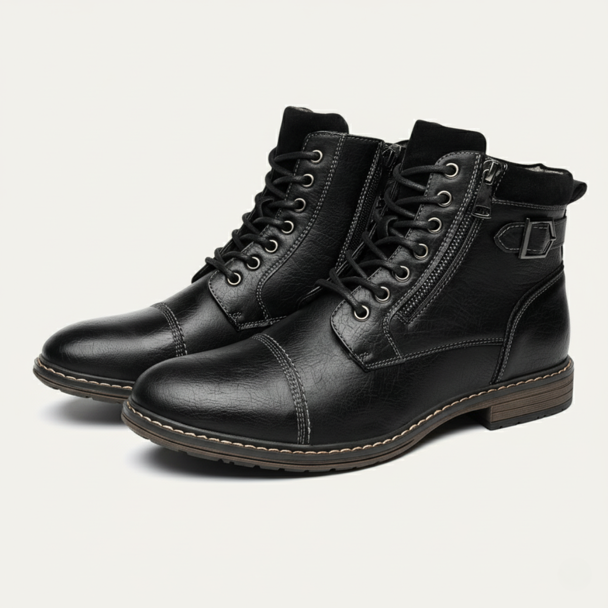 Black ankle boots with lace-up, side zip, and buckle accent at collar.
