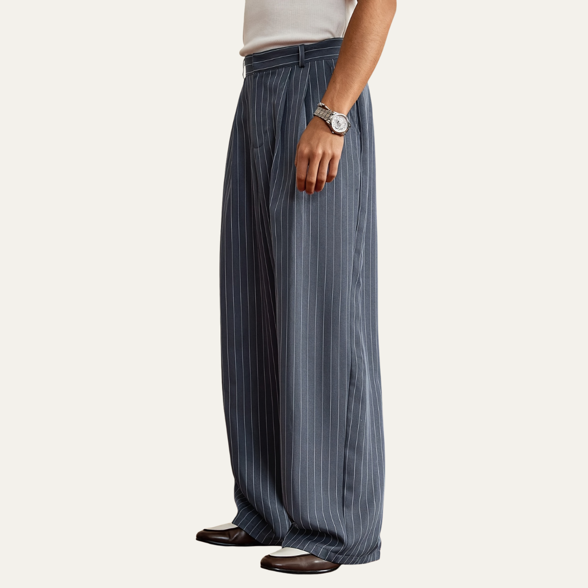 Navy pinstripe wide-leg dress pants with side pockets and long relaxed legs