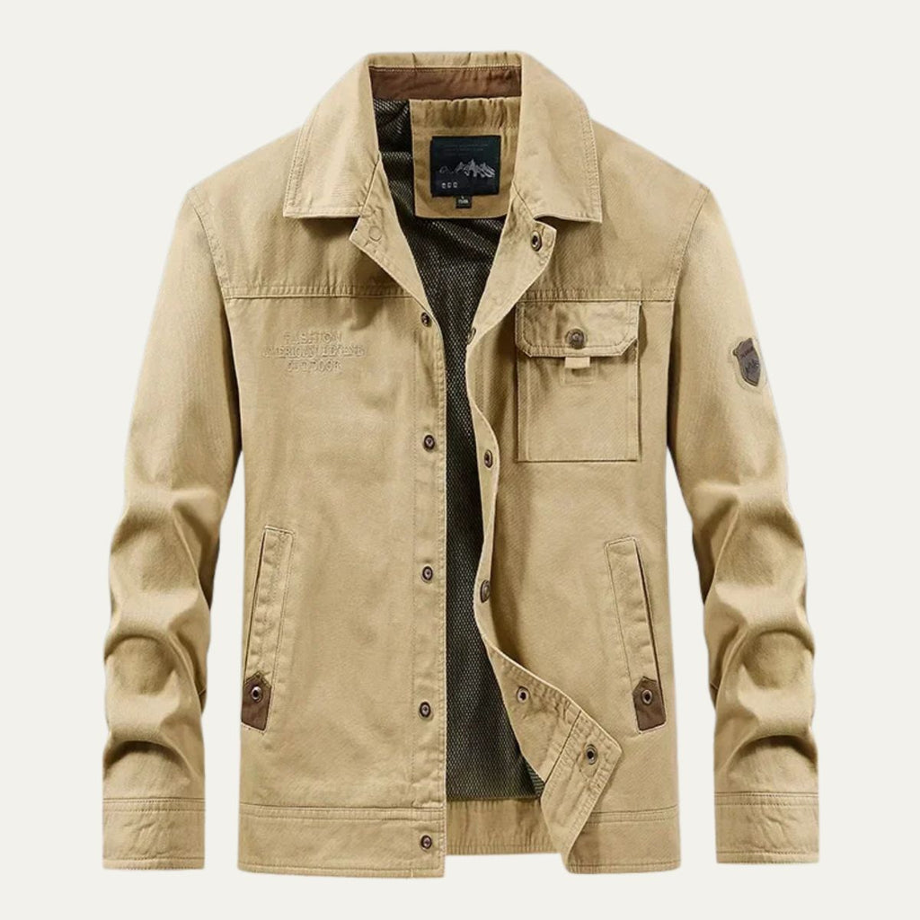 Beige men’s utility jacket with button front and flap chest pocket, multiple utility pockets