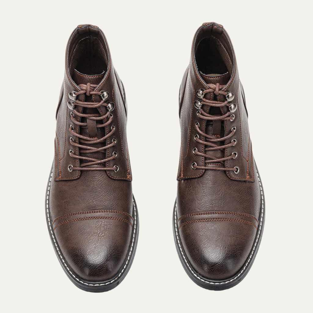 Pair of men's dark brown lace-up ankle boots with brown laces and contrast stitching