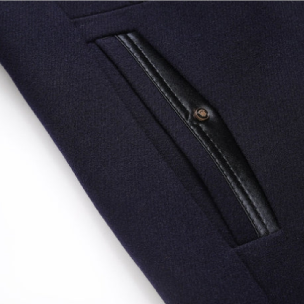 Men's wool coat pocket flap with black leather-trim detail