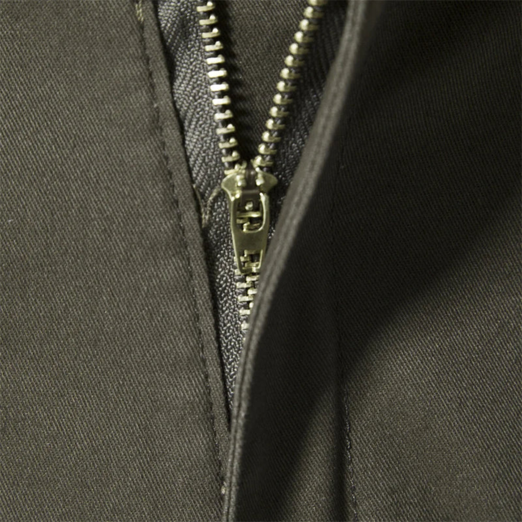 Army-green men’s cargo jogger pants, front zipper fly close-up