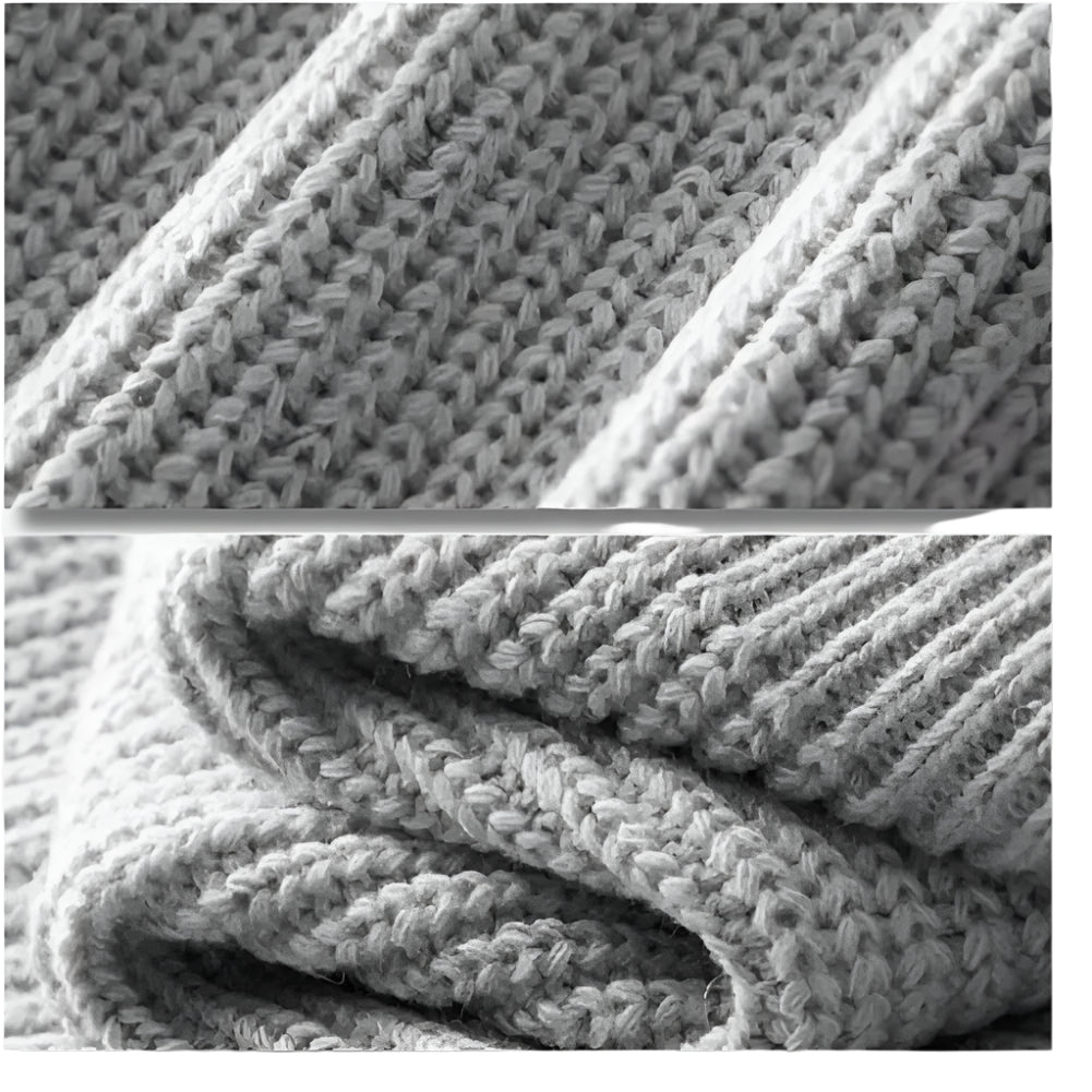 Close-up of light gray ribbed merino knit fabric with textured weave