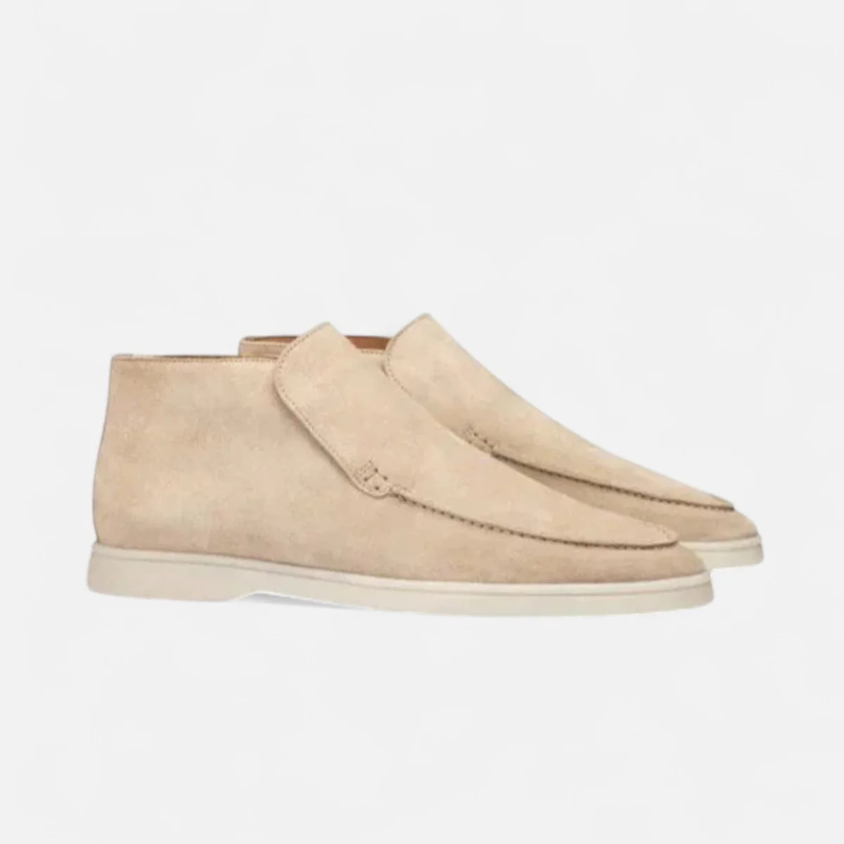 Beige suede slip-on loafers with moc-stitched detail and white rubber sole