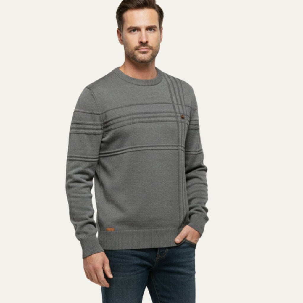 Men's dark gray crew neck sweater on model, ribbed collar and striped front yoke