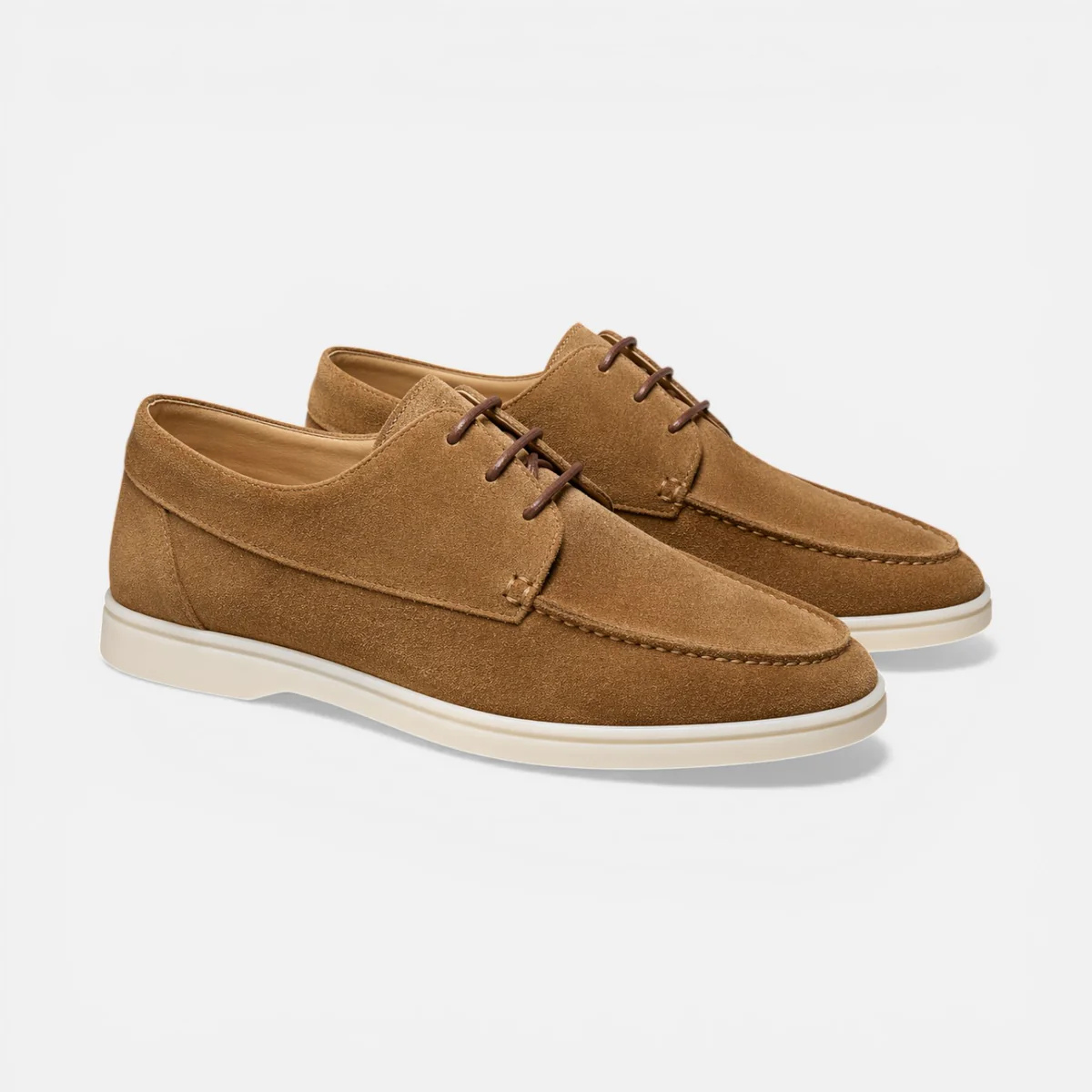 Men’s suede lace-up dress shoes in brown, angled view with stitched apron
