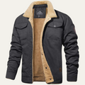Men’s winter coat in dark charcoal navy with tan fleece lining and snap pockets
