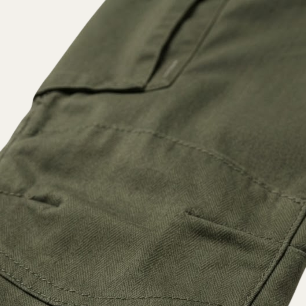 Army-green men’s cargo jogger pants, cargo pocket with flap stitching detail