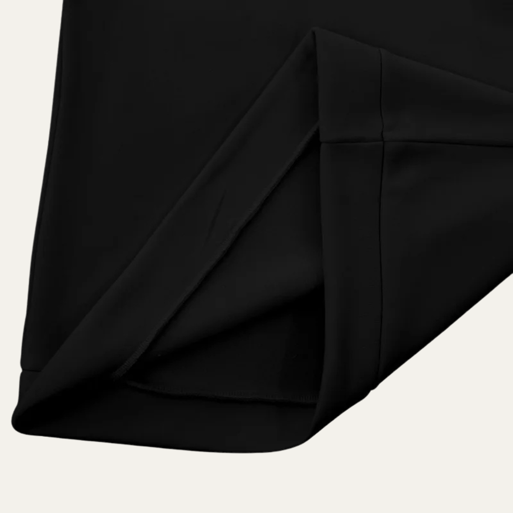 Black sweater hem and side seam detail with smooth knit texture