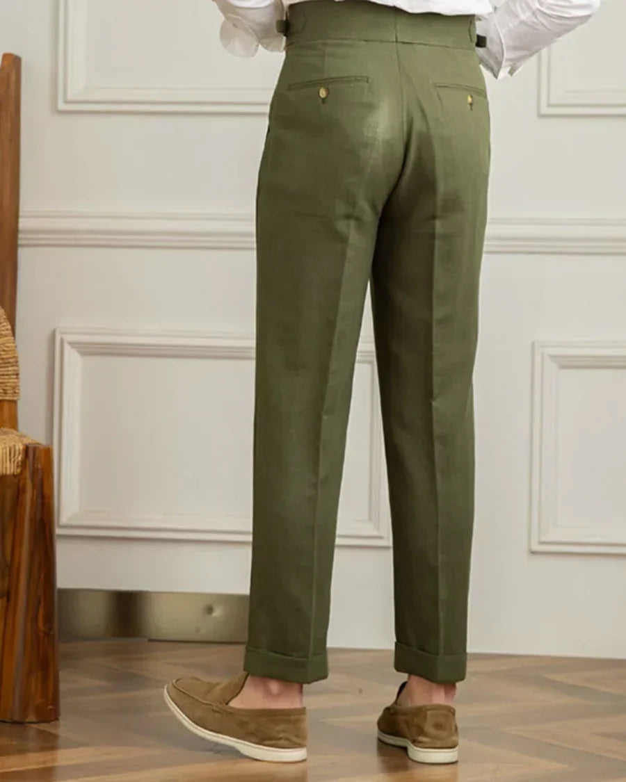Dark green pleated linen trousers with button waist and belt loops