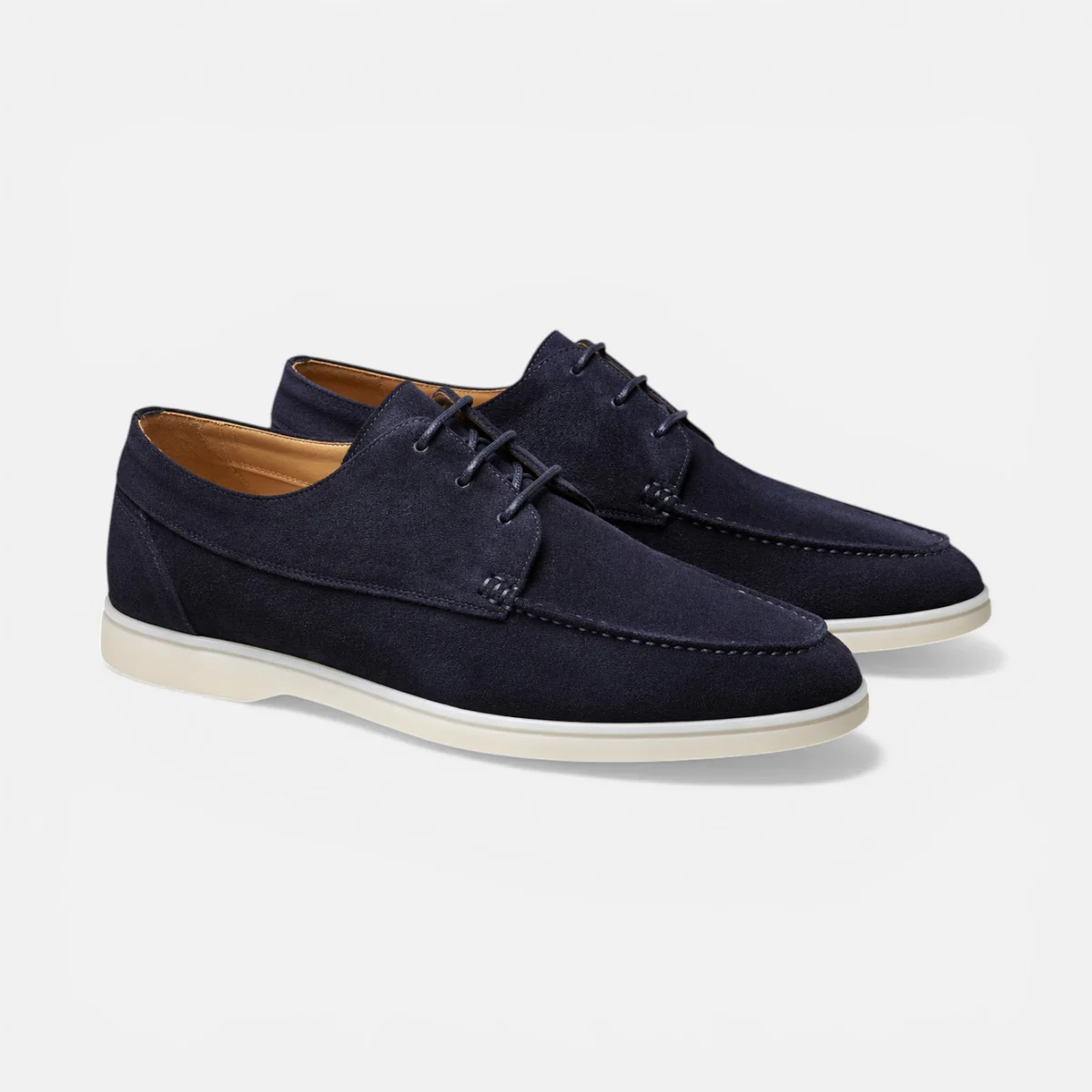 Men’s suede lace-up dress shoes in navy, angled view with clean stitched seams