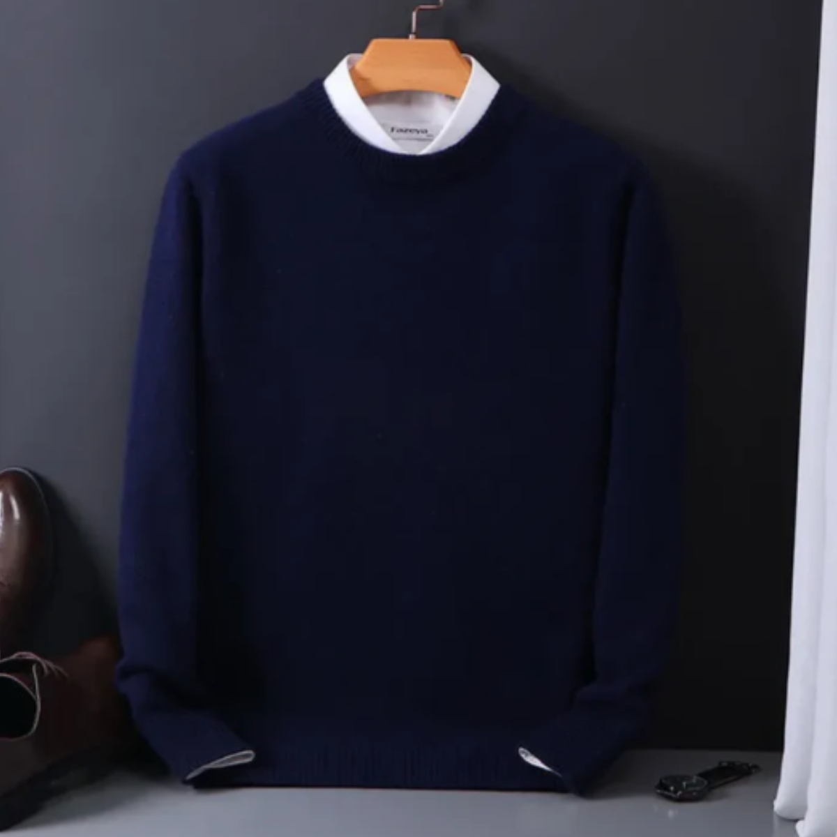 Men’s cashmere crew neck sweater on hanger, long sleeves, dark navy blue knit