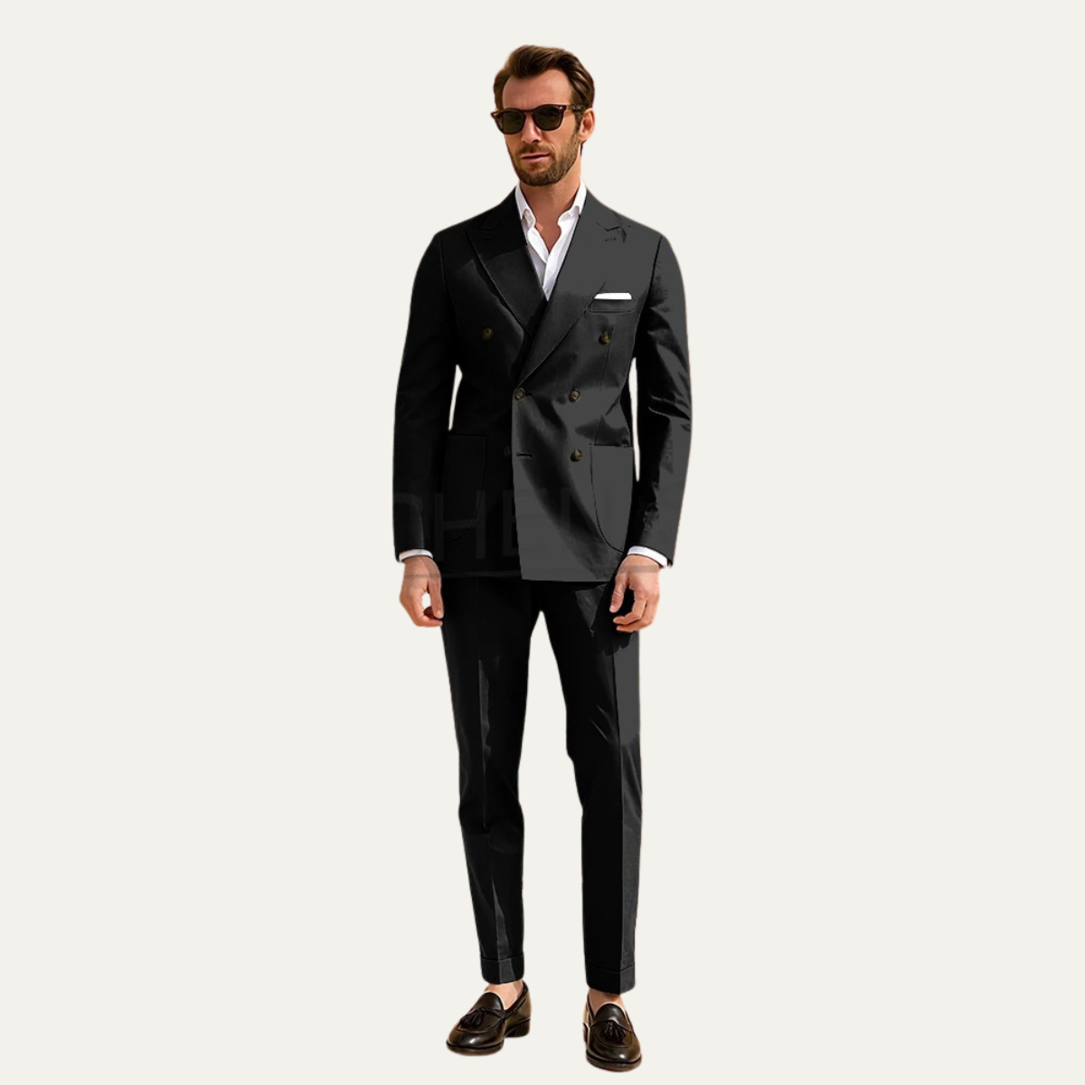 Men’s black slim fit suit with double-breasted blazer and matching tapered trousers