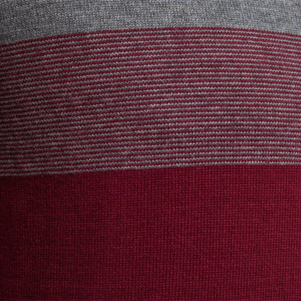 Burgundy knit stripe with gray and dark navy bands on patchwork sweater