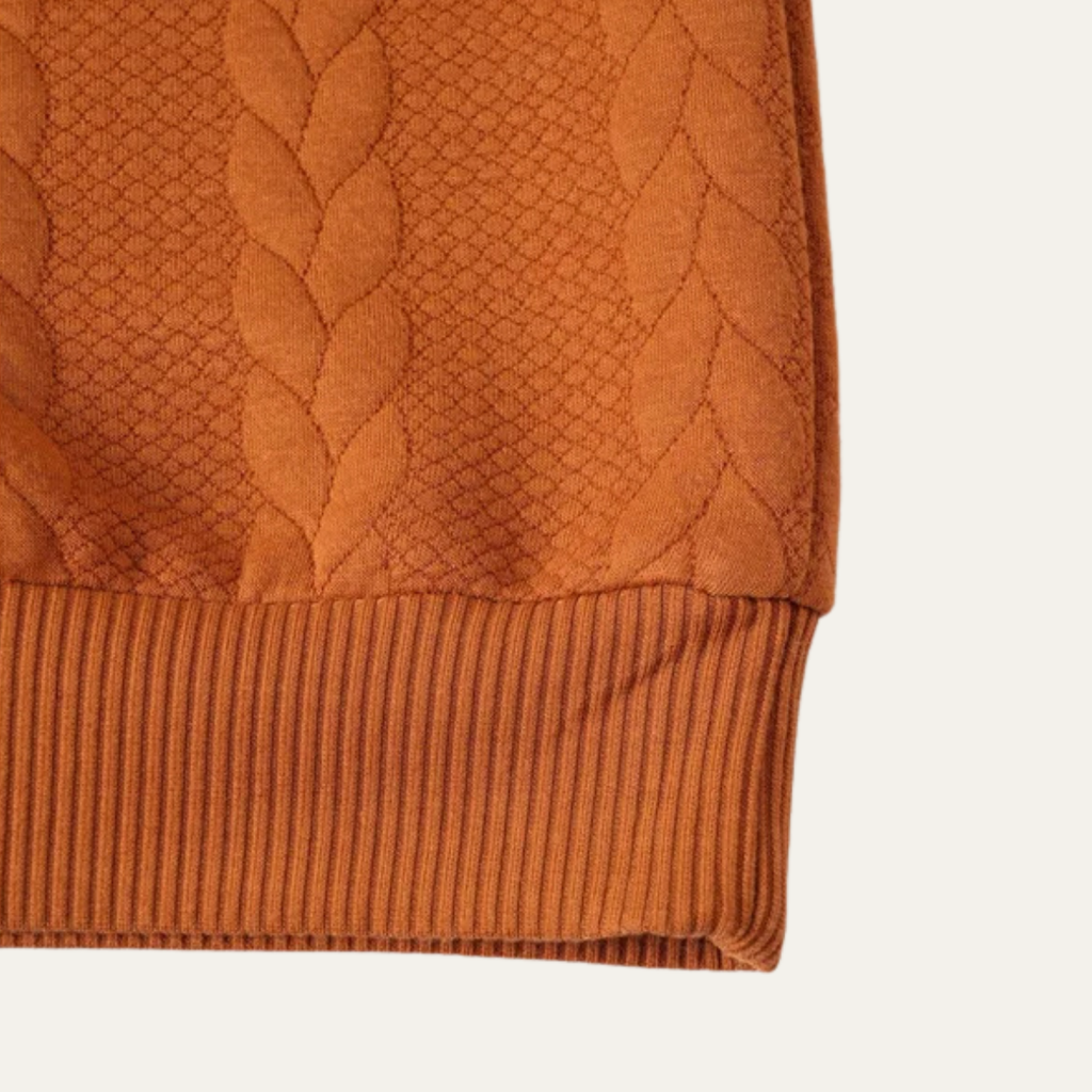 Men's turtleneck sweater hem with ribbed cuffs, rust orange