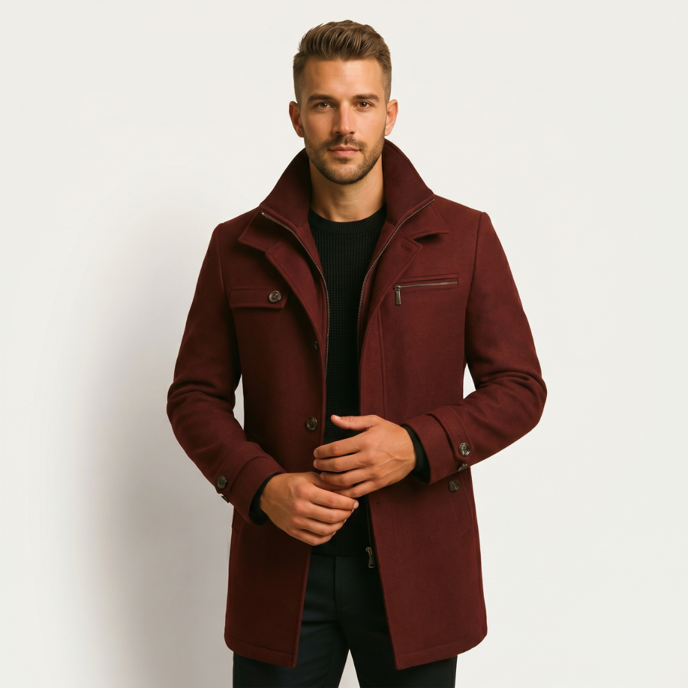 Burgundy wool-blend overcoat on model, front buttons, chest zip pocket, stand collar