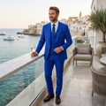 Men's slim-fit 3-piece suit in royal blue with vest and trousers, worn with a tie