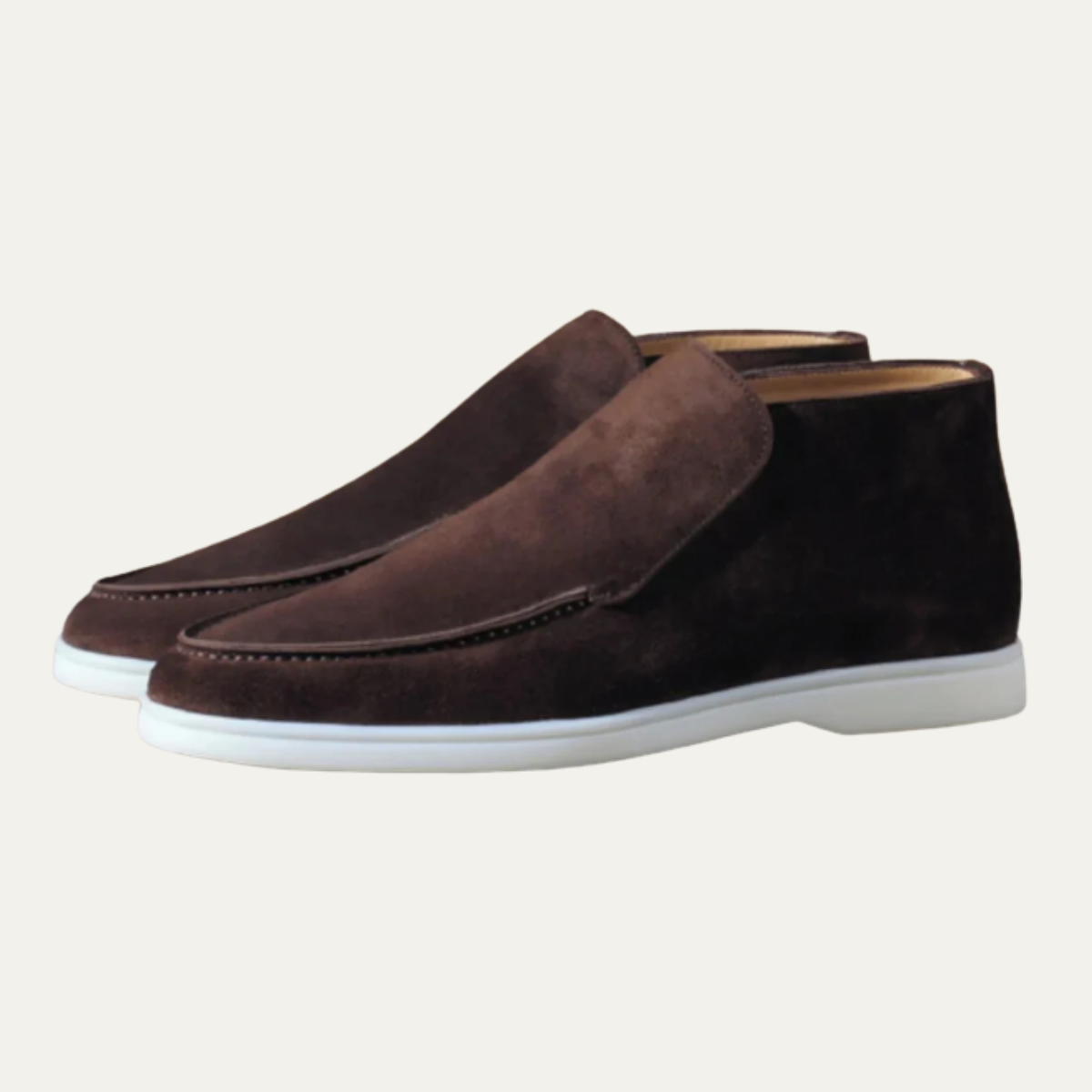 Men's dark-brown suede slip-on loafers with stitched moc toe and white rubber sole.