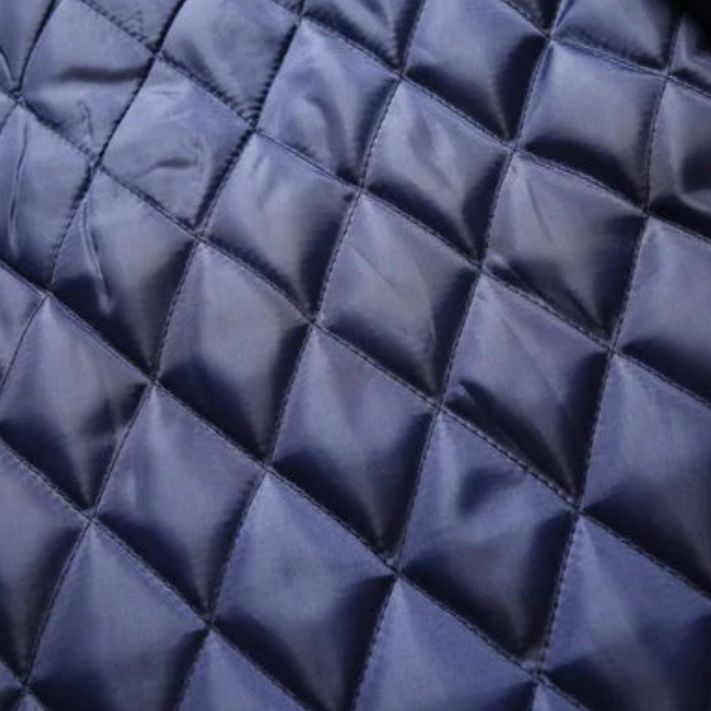Quilted coat lining in blue with diamond stitched pattern
