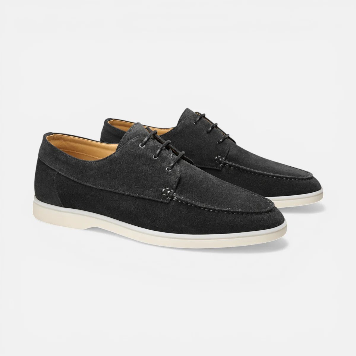 Men’s suede lace-up dress shoes in black, angled side view with contrast lining