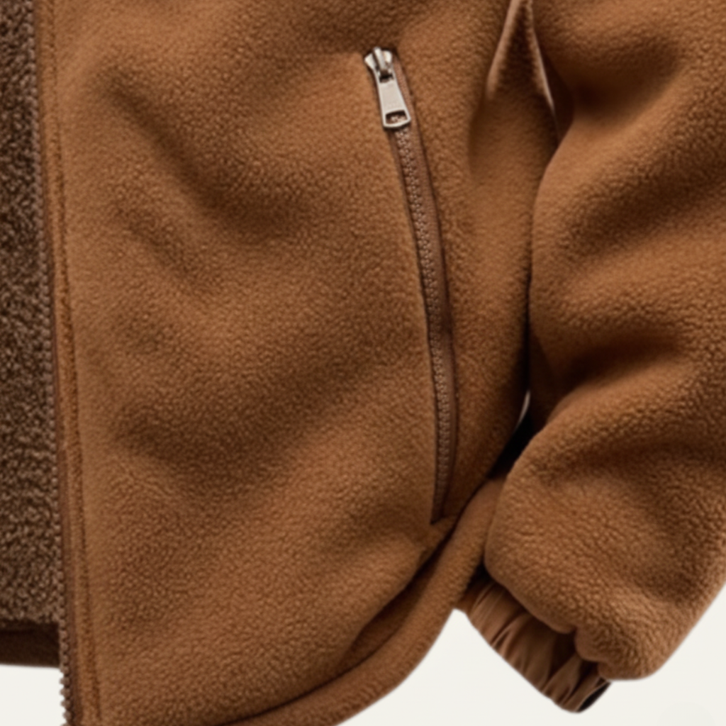Men's fleece-lined hooded jacket, tan; close-up of center zipper and fleece texture