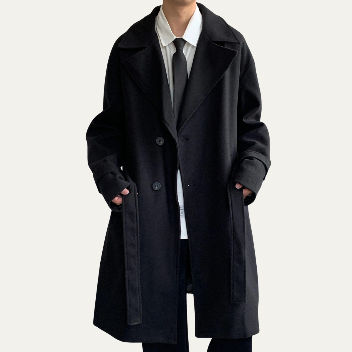 Black long overcoat with notch lapels, front buttons, and flap pockets